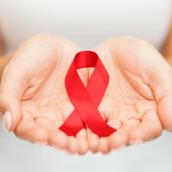 Symbolbild für den Welt-Aids-Tag © Canva white speaker network news line logo